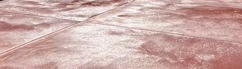 Close view of coloured concrete with full depth oxide pigment